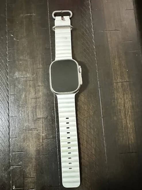 Unlocked Apple Watch Ultra 49mm Titanium Case With White Ocean Band,