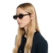 Oval frame sunglasses in black | GUCCI® US